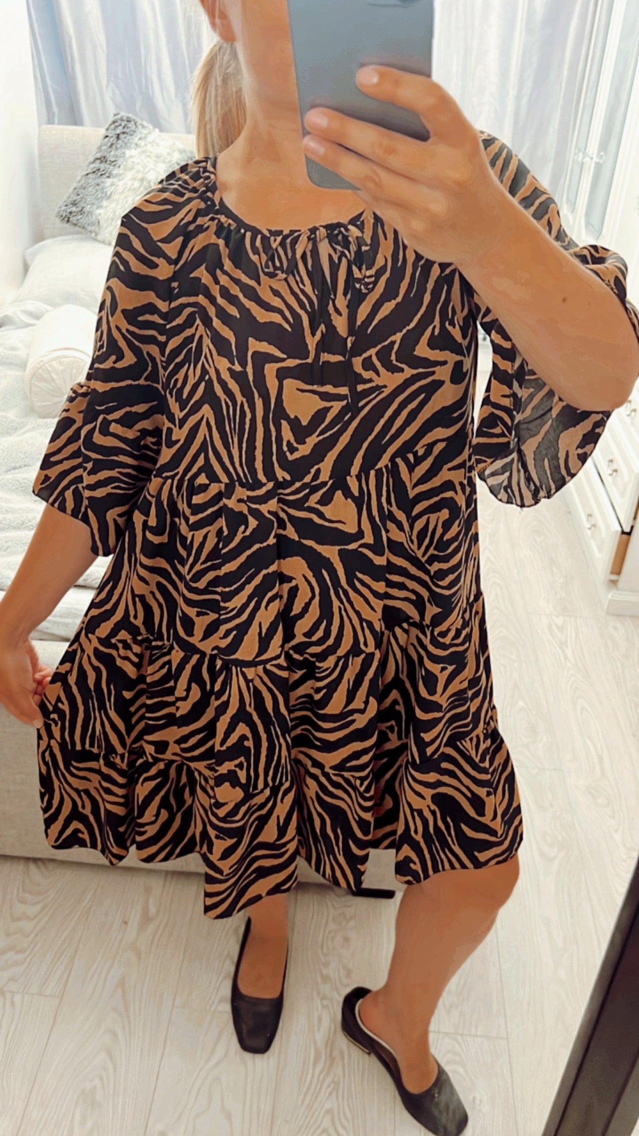 ANIMAL PRINT SWING DRESSES
